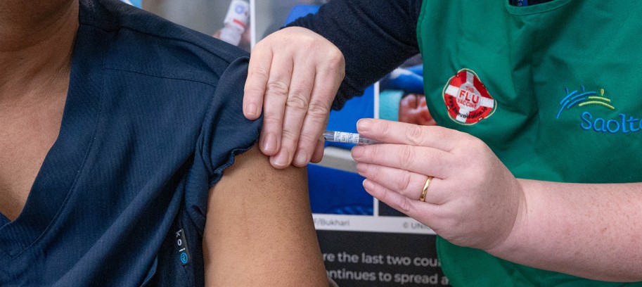 person receiving flu vaccination